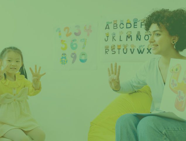 Teacher showing young children how to count.