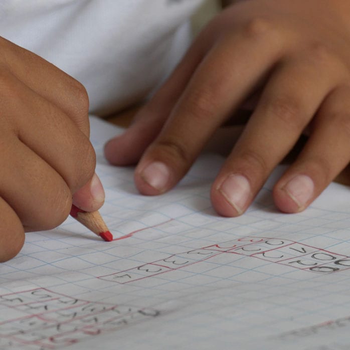 Child with pencil and paper