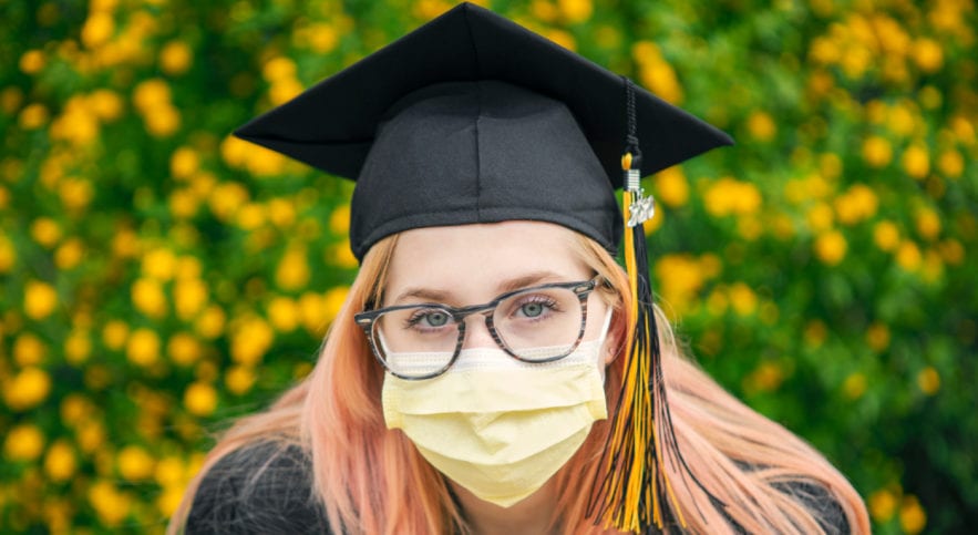 graduate in face mask