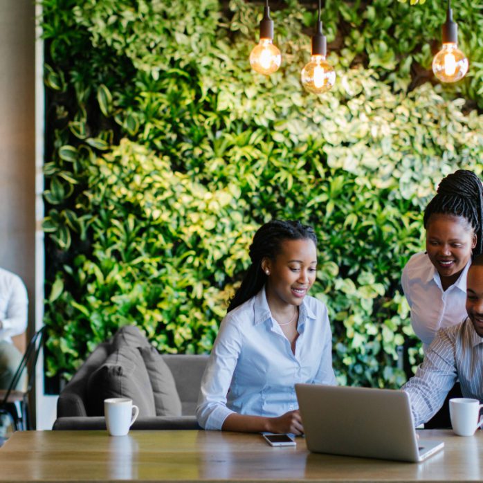 Employees happily working together